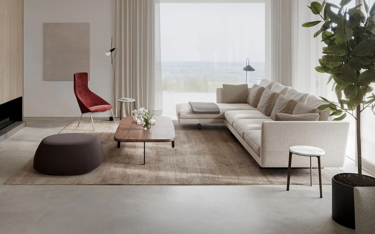 ergoform von Scheschy GmbH Wohnzimmer mit Couch, Hocker, Sessel und Couchtisch